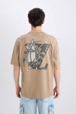 ⁦تيشرت محبوك برقبة دائرية ضيقة وأكمام قصيرة شبابي طراز D5619AX من ديفاكتو⁩ - الصورة ⁦5⁩