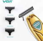 ⁦ماكينة حلاقة احترافية بدون اسلاك V-911 من في جي ار وشفرات الستانلس ستيل وكيبل شحن USB مع 3 امشاط للرجال. وقت التشغيل: 180 دقيقة بطارية ليثيوم ايون 1200 مللي امبير لون ذهبي في-911⁩ - الصورة ⁦4⁩