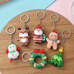 ⁦ميداليات كريسماس متعددة الألوان مع دلاية سيليكون لجميع الأعمار هدايا الكريسماس للأطفال بأشكال وألوان 10 سم 36 قطعة⁩ - الصورة ⁦3⁩