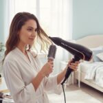 ⁦مجفف شعر احترافي أيوني 2400 وات، تجفيف سريع، ضوضاء منخفضة، سرعتين وإعدادين للحرارة، مكثف قابل للفصل، حماية من الحرارة الزائدة، موديل SK-14021 (أسود وذهبي)⁩ - الصورة ⁦6⁩