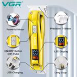 ⁦ماكينة حلاقة احترافية لاسلاكية V-956 من في جي ار شاشة LED قابلة لاعادة الشحن شفرات ستانلس ستيل كابل USB مع 3 امشاط للرجال مدة تشغيل: 100 دقيقة بطارية ليثيوم ايون 500 ميلي امبير الساعة ذهبي⁩ - الصورة ⁦3⁩