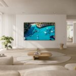 ⁦تلفزيون سمارت كريستال UHD DU9000 مقاس 98 بوصة دقة 4K وحركة اكسيليراتور 120 هرتز وصوت كيو سيمفوني ونظام تشغيل تايزن وموزع الألعاب موديل 2024 UA98DU9000UXEG من سامسونج، أسود جرافيت⁩ - الصورة ⁦8⁩