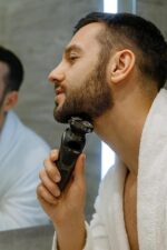⁦ماكينة حلاقة اللحية - ماكينة حلاقة كهربائية دوارة 3 رؤوس عائمة، طاقة 5 واط، ماكينة حلاقة محمولة متعددة الوظائف قابلة للغسل للوجه واللحية، مؤشر ضوئي للشحن، مقاومة للماء IPX6، HG-2058⁩ - الصورة ⁦6⁩