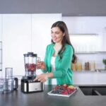 محضر طعام مضغوط FP3233SI بيور ايز من براون، عصارة حمضيات، ملعقة سباتولا، أداة عجين، مطحنة بلاستيكية متعددة، خلاط 1.2 لتر ووعاء 2.1 لتر، 800 وات، أسود - الصورة 4
