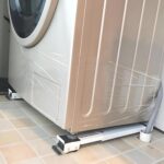 ⁦A pair of adjustable bases for heavy household appliances, suitable for washing machines and refrigerators, with adjustable wheels for safe and smooth movement⁩ - الصورة ⁦4⁩