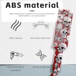 ⁦مشط شعر احترافي بتصميم جمجمة، مصنوع من مادة ABS، احمر وابيض، بطول 22 سم، اداة تصفيف لفك تشابك الشعر للرجال والنساء⁩ - الصورة ⁦2⁩