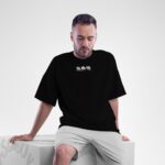 ⁦تيشيرت واسع بتصميم أنيمي فريد على الجهتين للرجال⁩ - الصورة ⁦4⁩